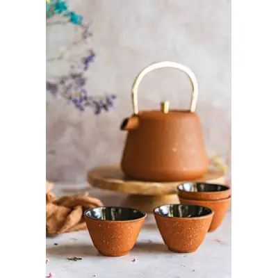 Gietijzeren set met 1L AGNES waterkokers roestig